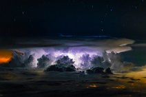 Illuminated thunderclouds seen from the air 01 Illuminated thunderclouds seen from the air 01.jpg