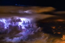 Illuminated thunderclouds seen from the air 03 Illuminated thunderclouds seen from the air 03.jpg